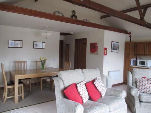 Living and dining area photograph in Poppy Cottage, Brundall, Norfolk.