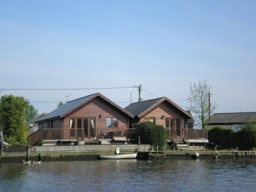 Two Riverside Lodges in Brundall Norfolk in the Norfolk Broads